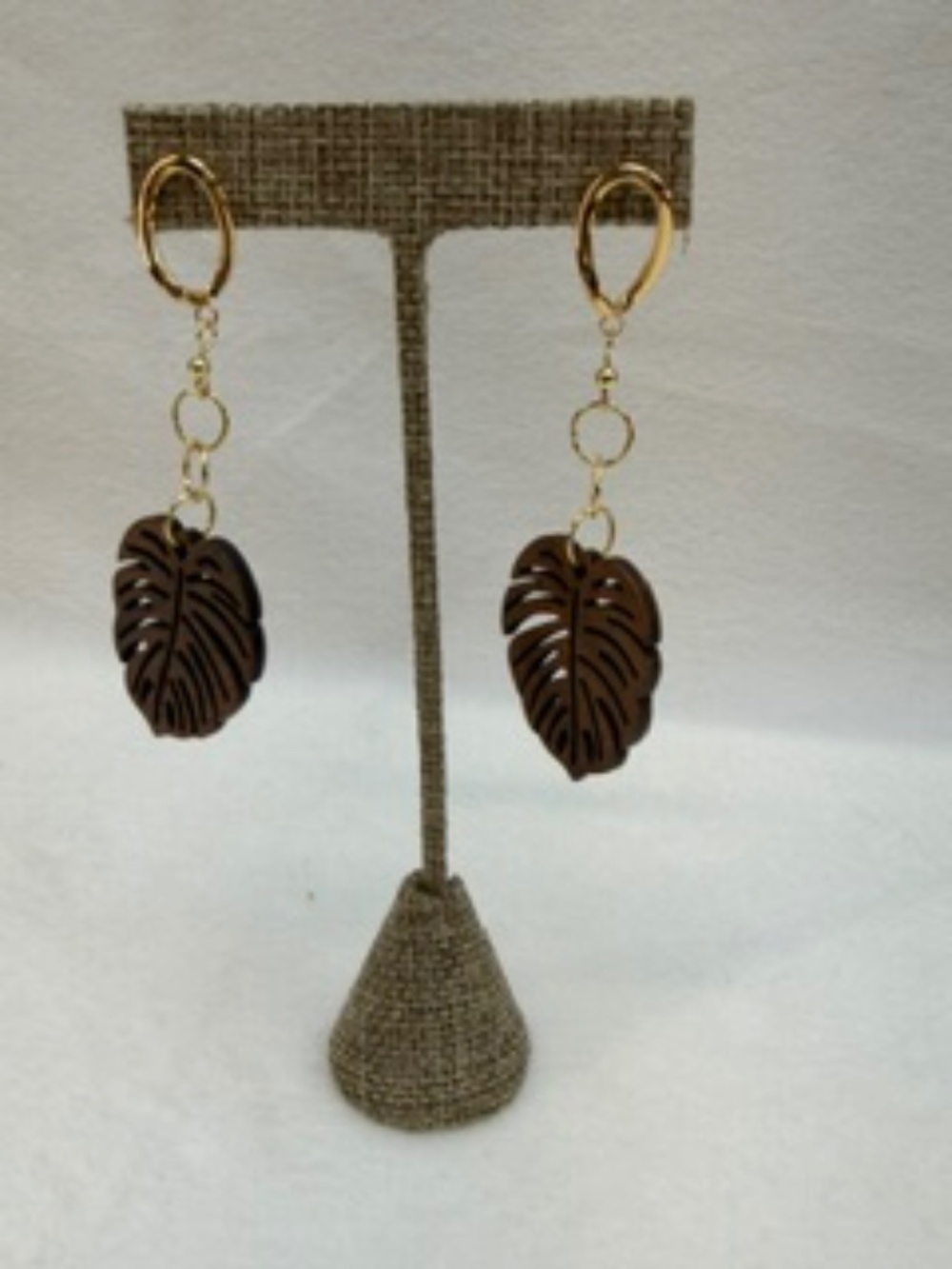 18 k gold Hawaiian monstera leaf wood earring.